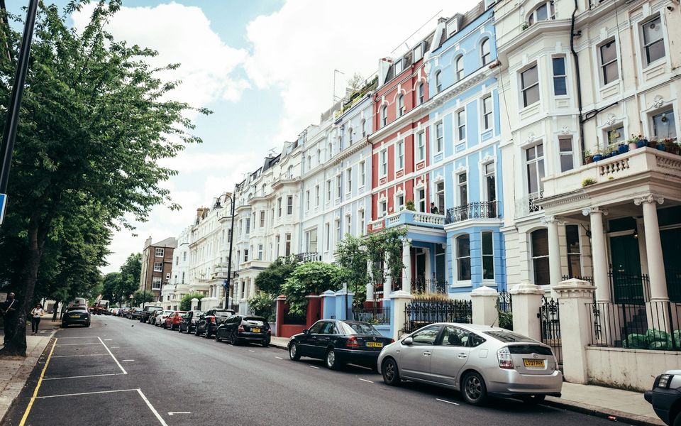 Colourful terraced houses on a Chelsea street in west London