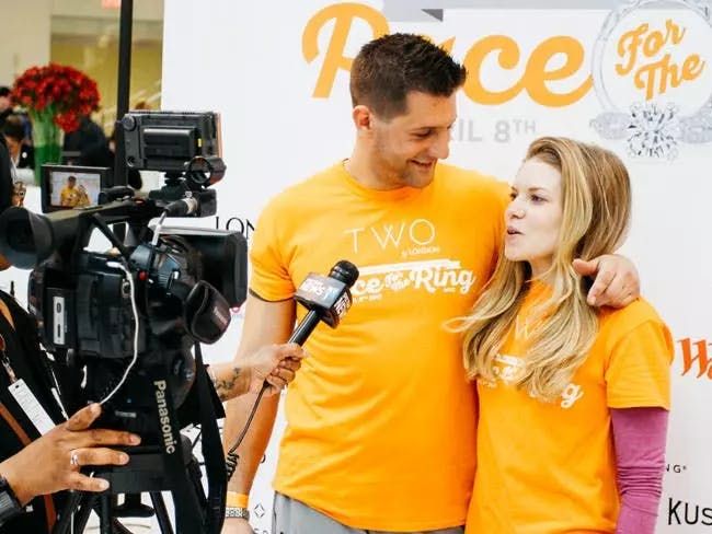 Race For The Ring team participants being interviewed following the event