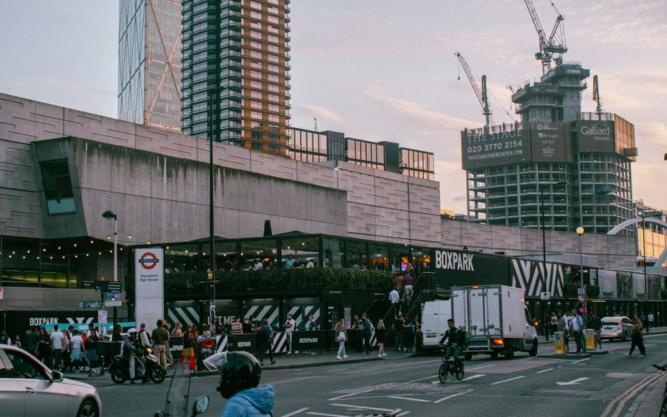 Boxpark and Shoreditch High Street in east London at dusk