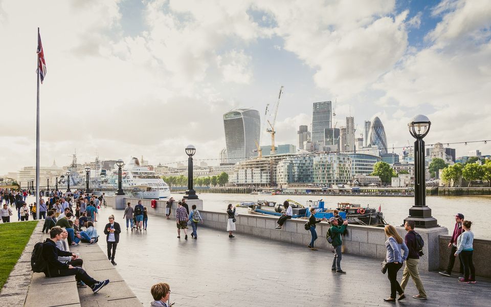 London South Bank riverside walk with views of the Thames and city skyline