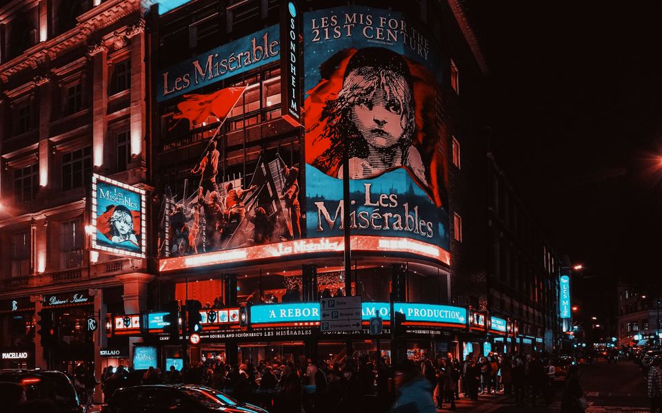 Busy streets and theatre lights in London's West End