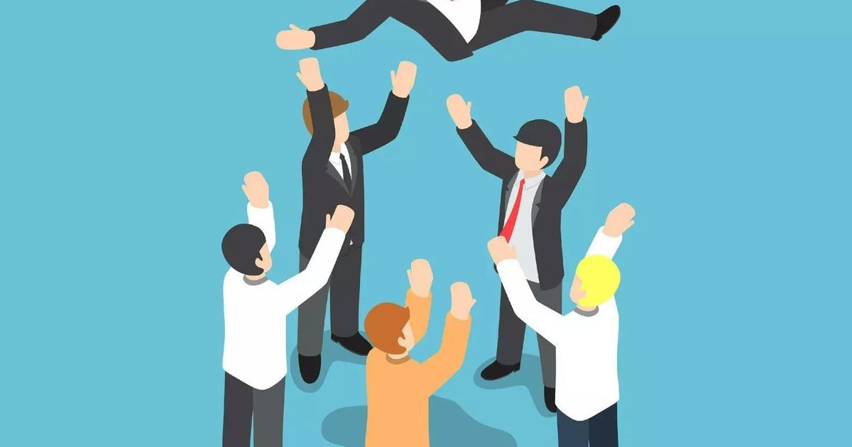 An isometric illustration of a business team tossing their red-haired colleague into the air to celebrate a major success or milestone against a solid blue background.