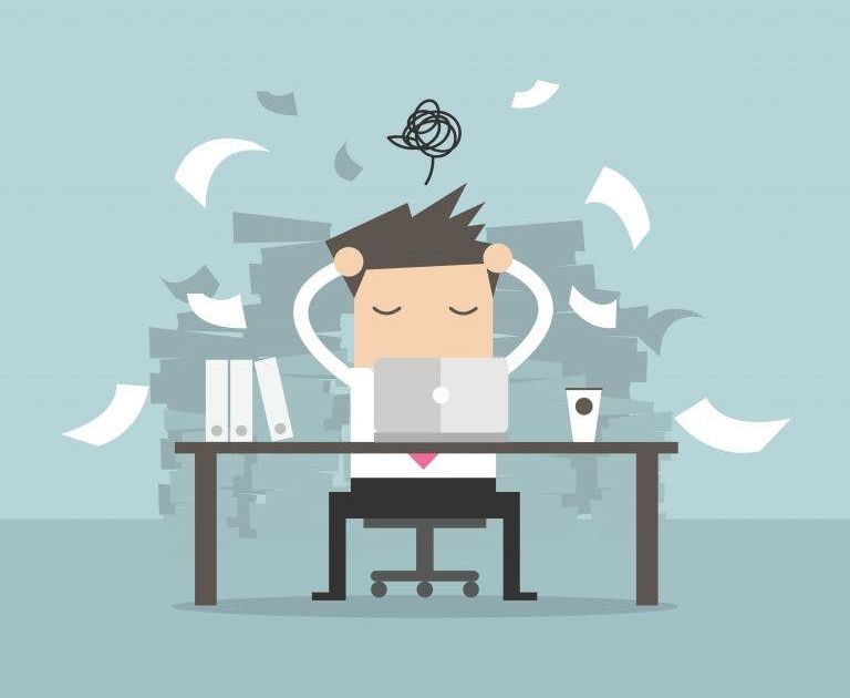 A flat vector illustration of an overwhelmed office worker holding his head in stress at his desk, surrounded by flying sheets of paper and massive piles of paperwork.